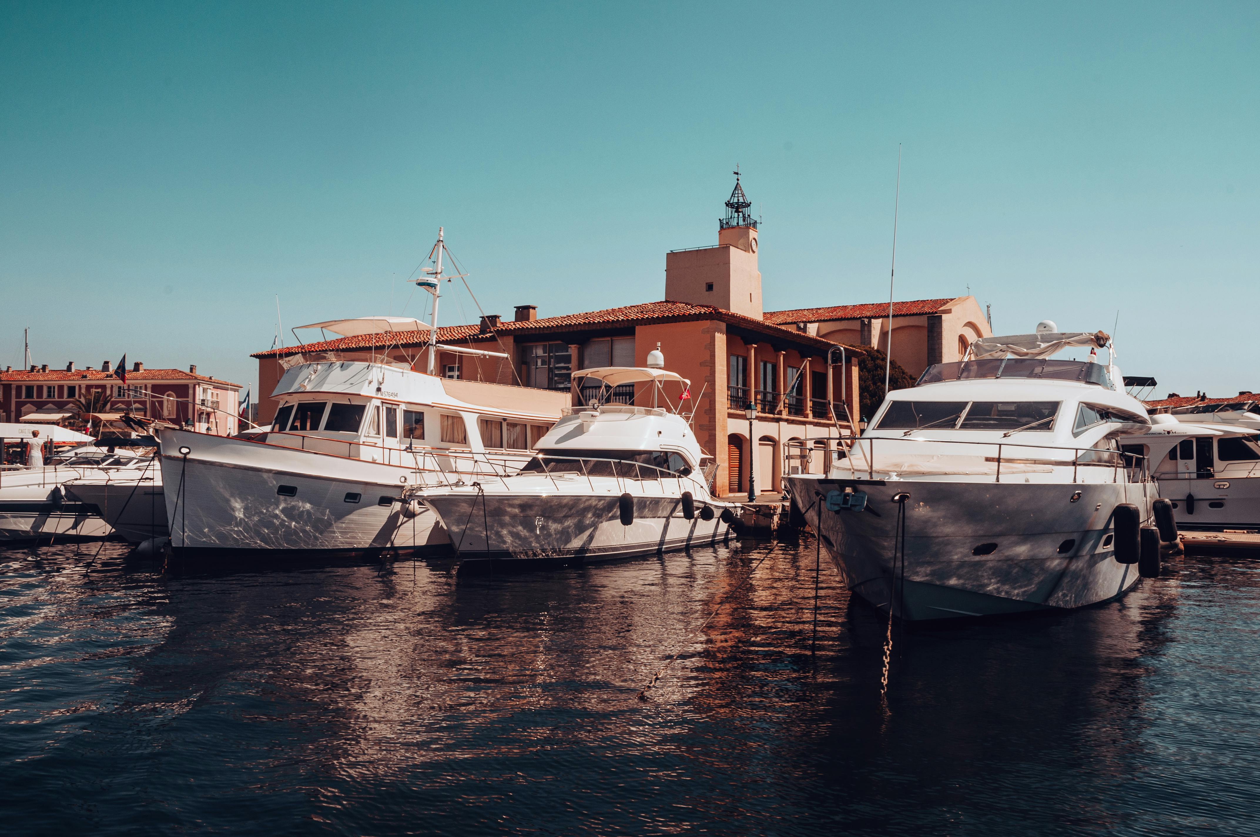 Free Charming harbor with luxury yachts docked in Grimaud, Provence-Alpes-Côte d'Azur, showcasing picturesque architecture. Stock Photo