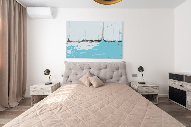 Bedroom Interior With Bed And Painting On Wall