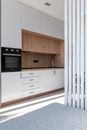 Apartment with open kitchen near bed