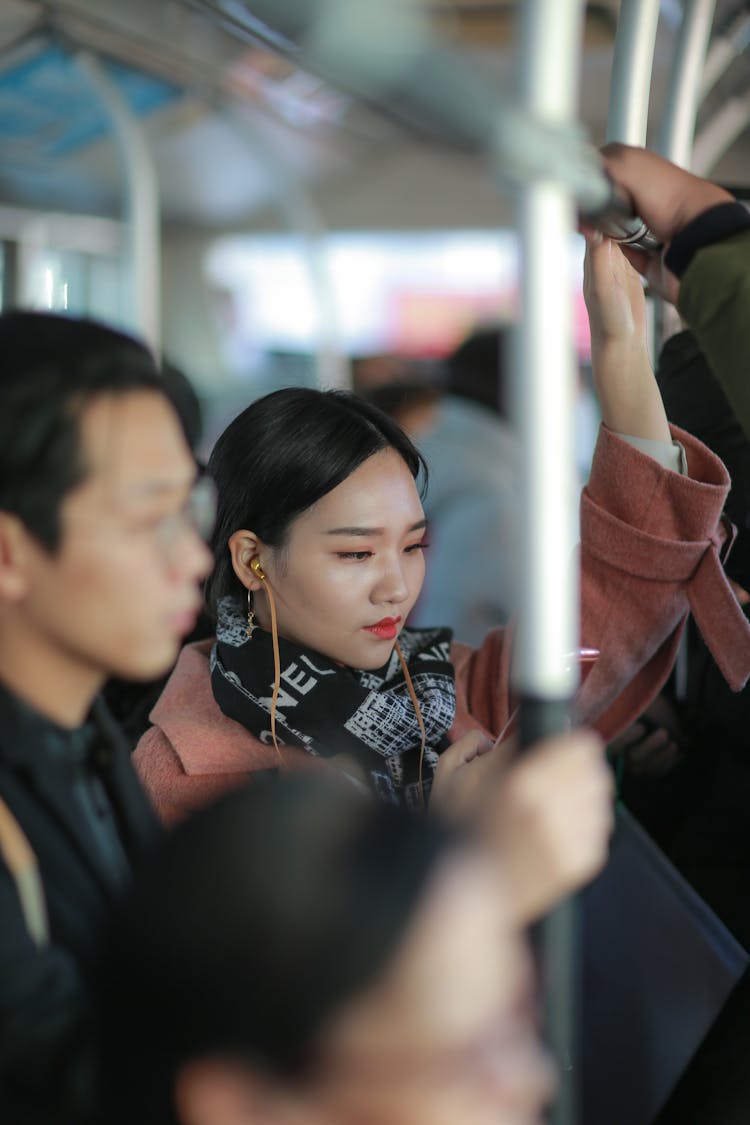 Trendy Young Ethnic Woman Commuting By Bus