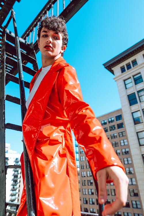 Person Wearing Orange Raincoat