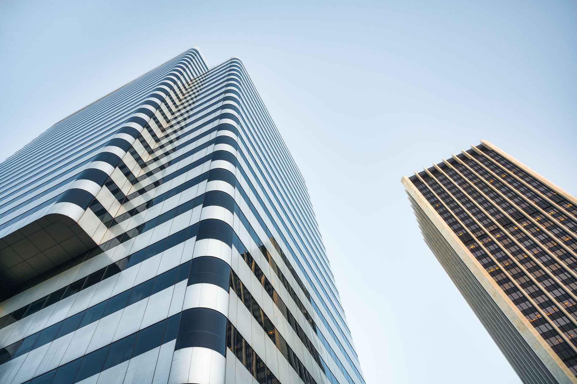 A minimalist architectural view of a global financial center at twilight, symbolizing structural resilience and strategic equilibrium.