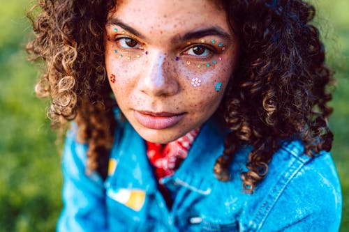 Freckled Woman Wearing Denim Jacket 