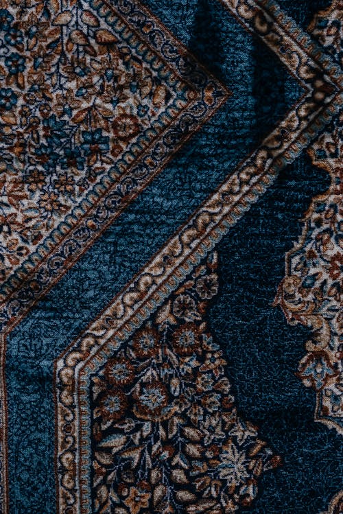 Free  Texture of A Carpet With Floral Print  In Close Up View Stock Photo