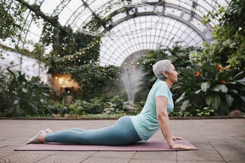 Free Woman Doing Cobra Pose Stock Photo