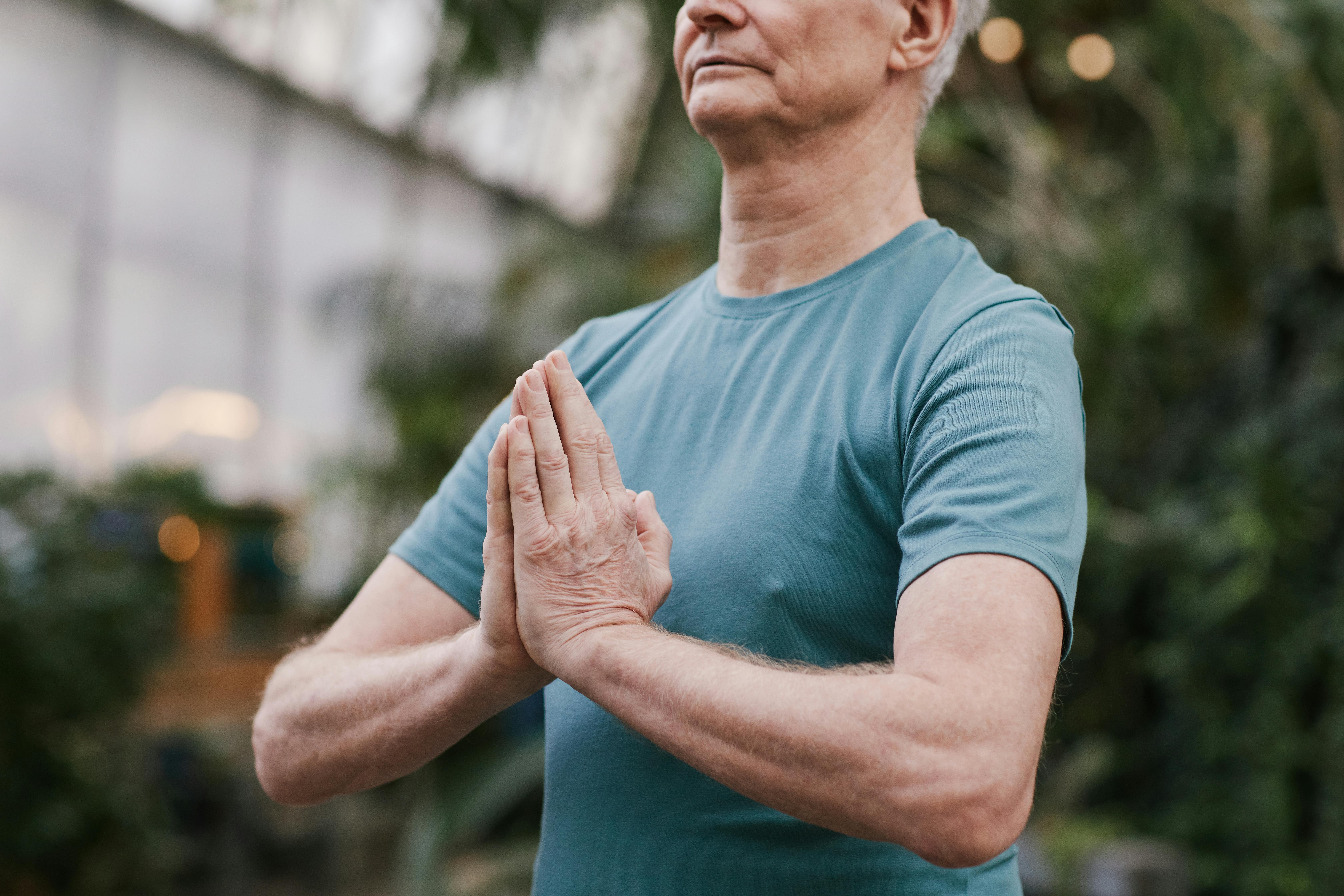 man practicing yoga