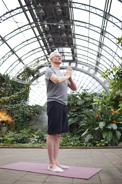 Free Man Practicing Yoga Stock Photo