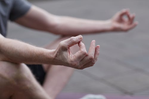 A Person Meditating