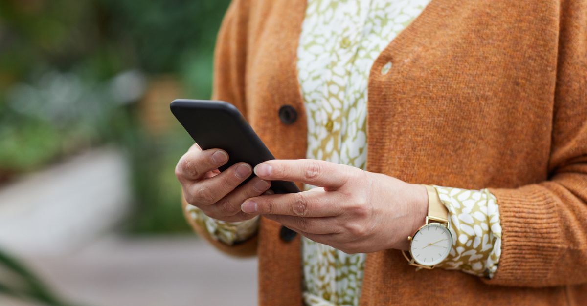 Person Using An Device Person Using Her Smartphone · Free Stock Photo