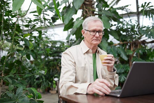 Man Busy Using His Laptop