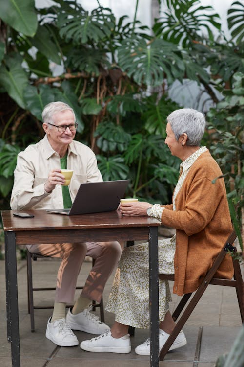 Lovely Couple Smiling While Looking at Each Other