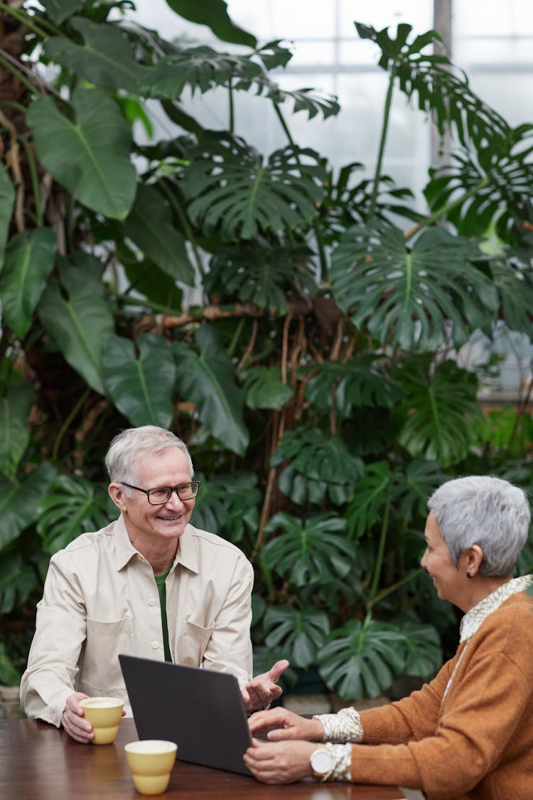 Lovely Couple Smiling While Looking At Each Other