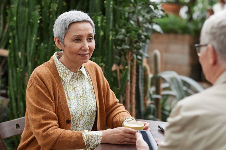 Woman Smiling While Looking At Her Man