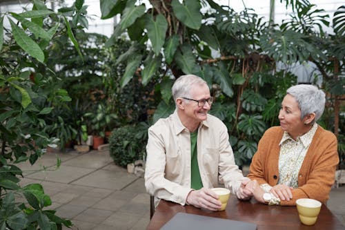 Lovely Couple Smiling While Looking at Each Other