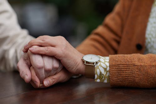 Free Couple Holding Hands Stock Photo