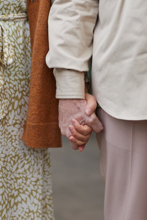 Free Couple Holding Hands Stock Photo