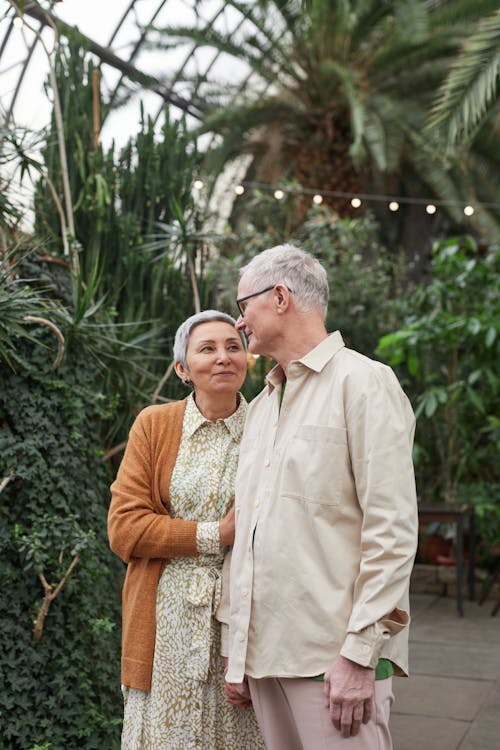 Couple Smiling While Looking at Each Other