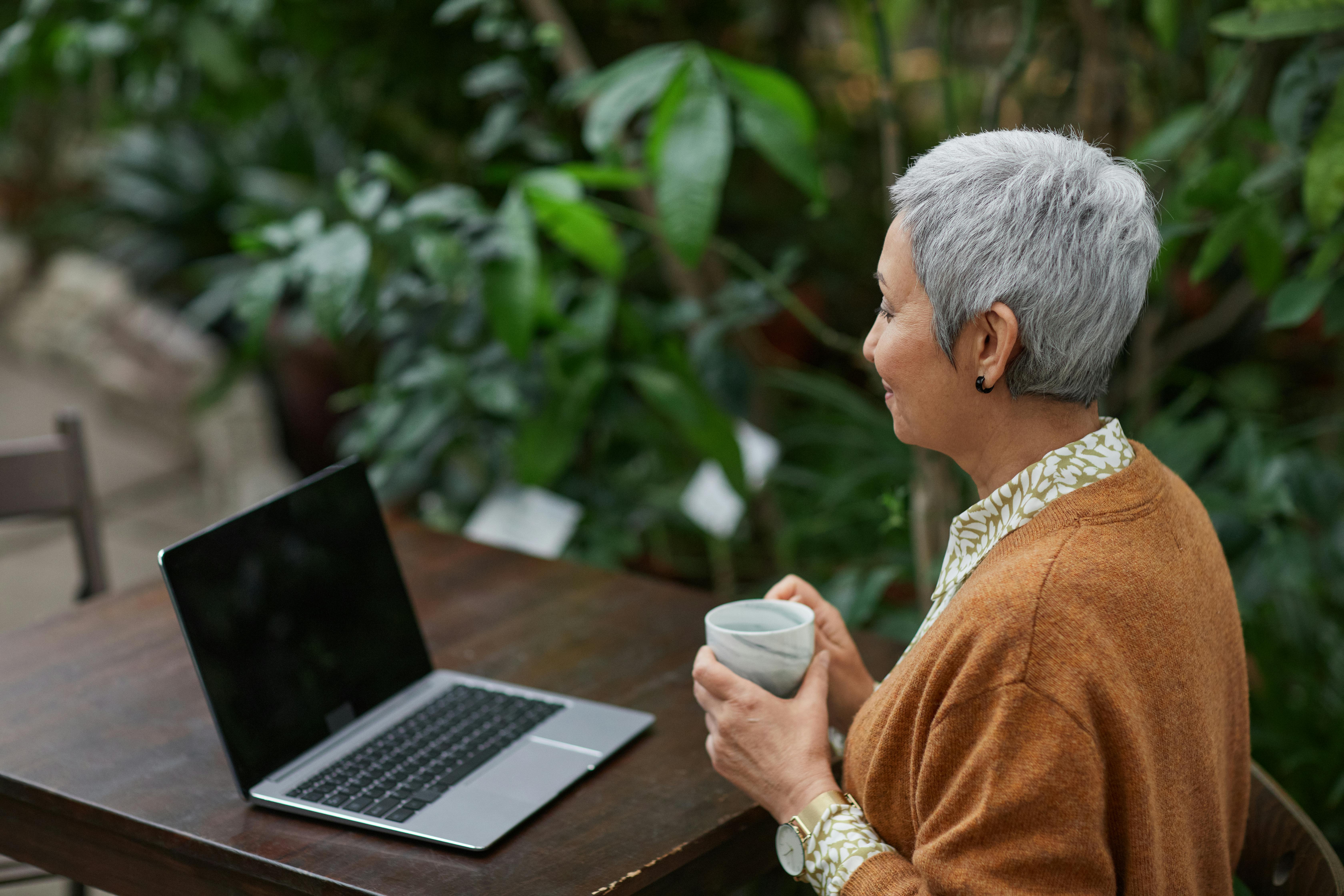 woman looking at her laptop