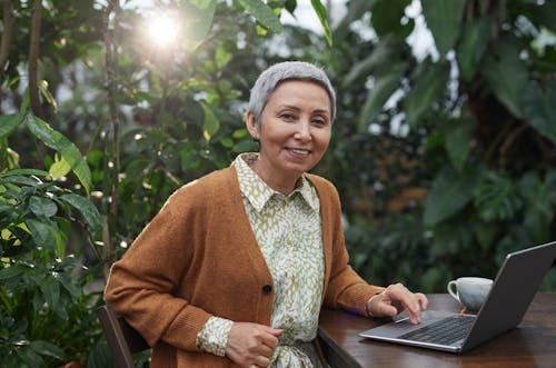 Woman Smiling While Looking at the Camera