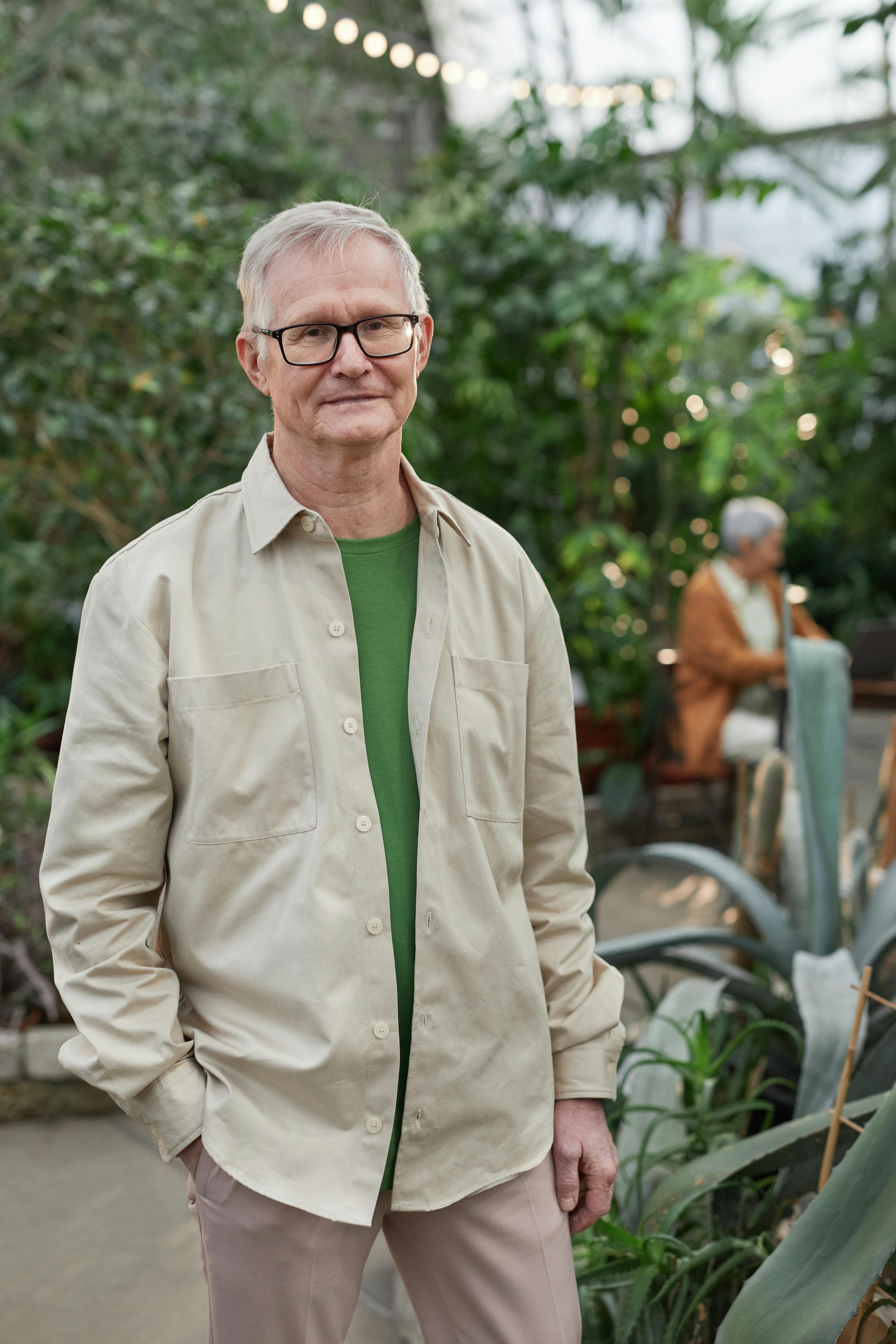 man wearing an eyeglasses while looking at the camera