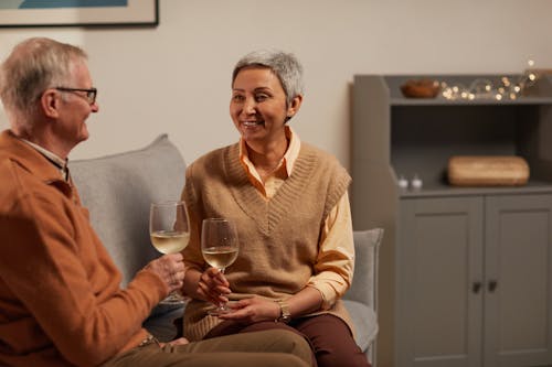 Free Lovely Couple Smiling While Looking at Each Other Stock Photo