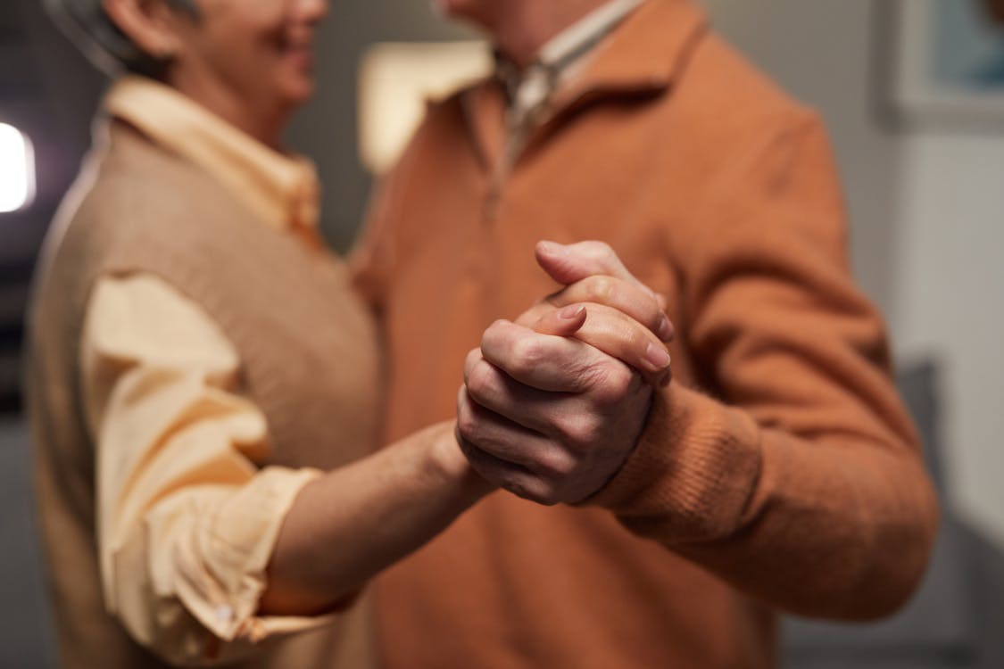 Free Couple Holding Each Other's Hands Stock Photo
