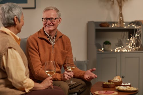 Lovely Couple Smiling While Talking to Each Other