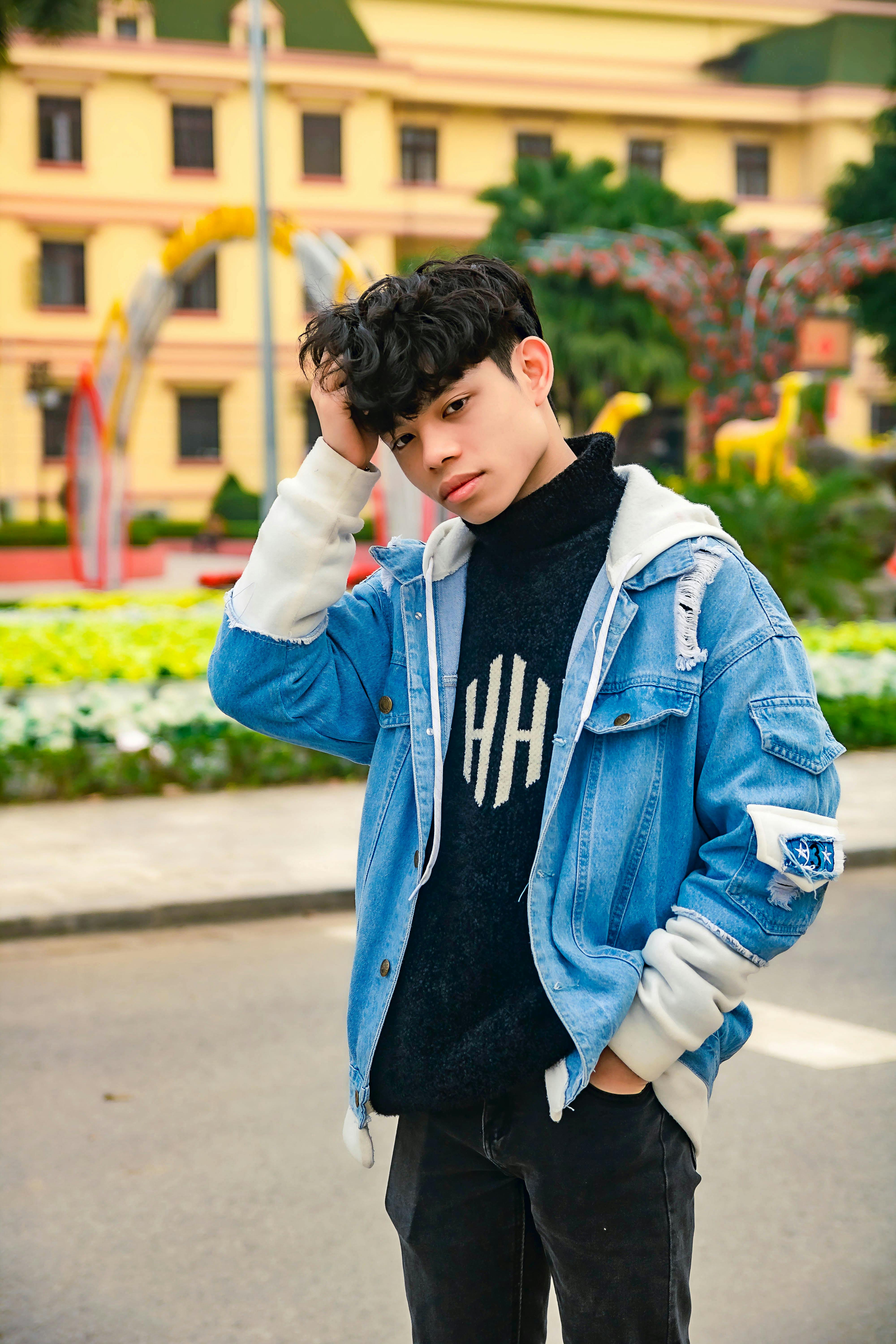 A Handsome Man in Denim Jacket Posing · Free Stock Photo