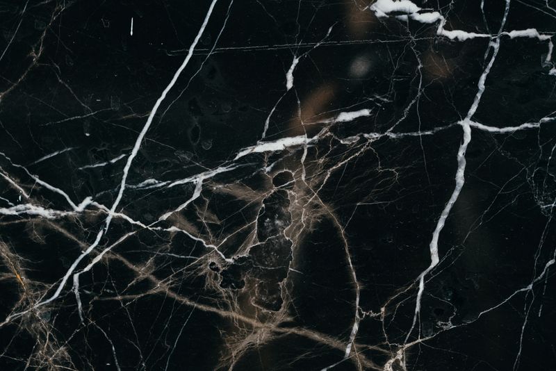 Close-up of black marble with white veining