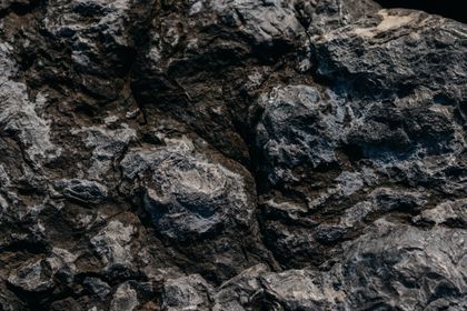 Dark mineral stone surface — Polina on Pexels