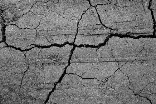 Textured dry ground in daylight