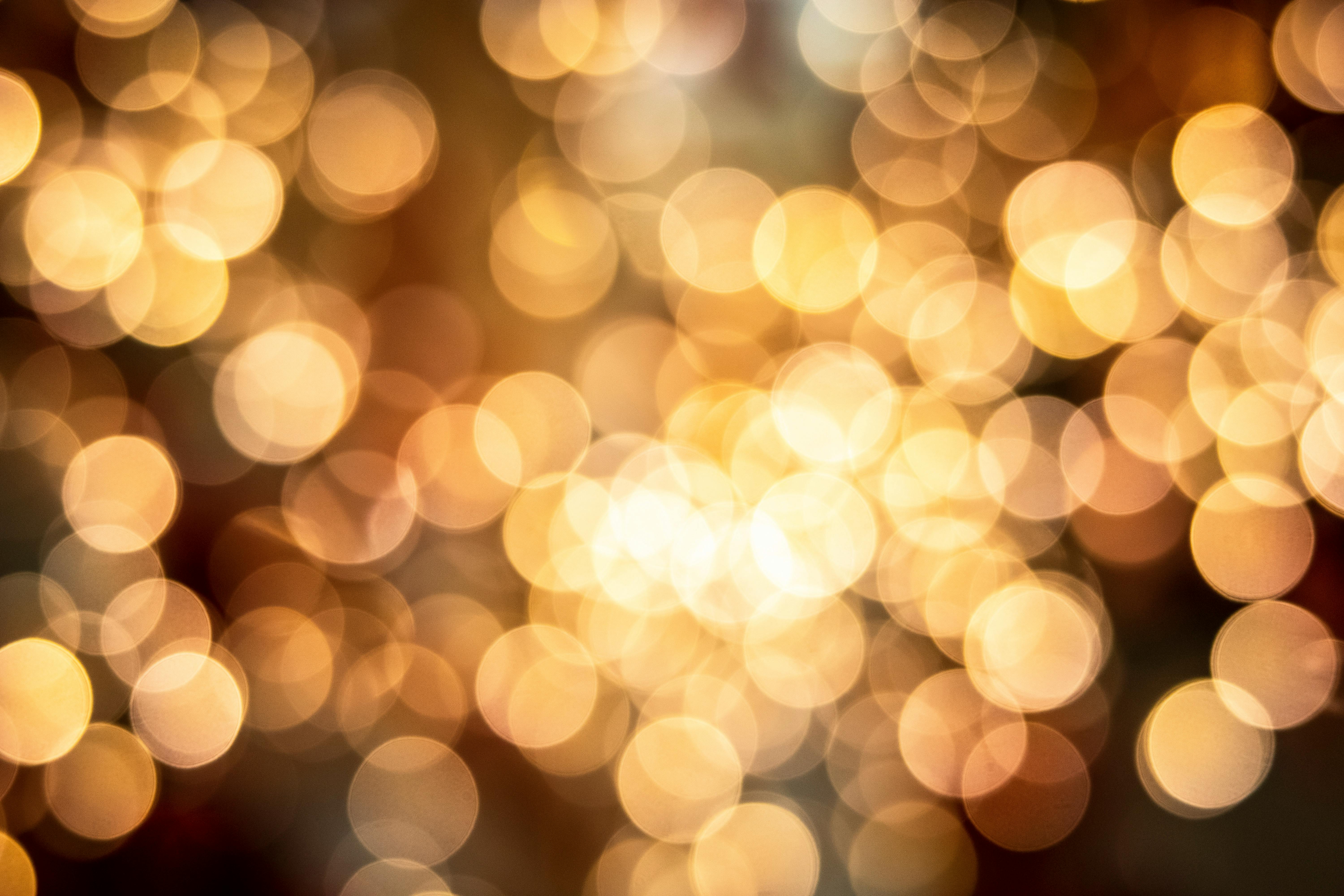 Blurred yellow lights on black background · Free Stock Photo