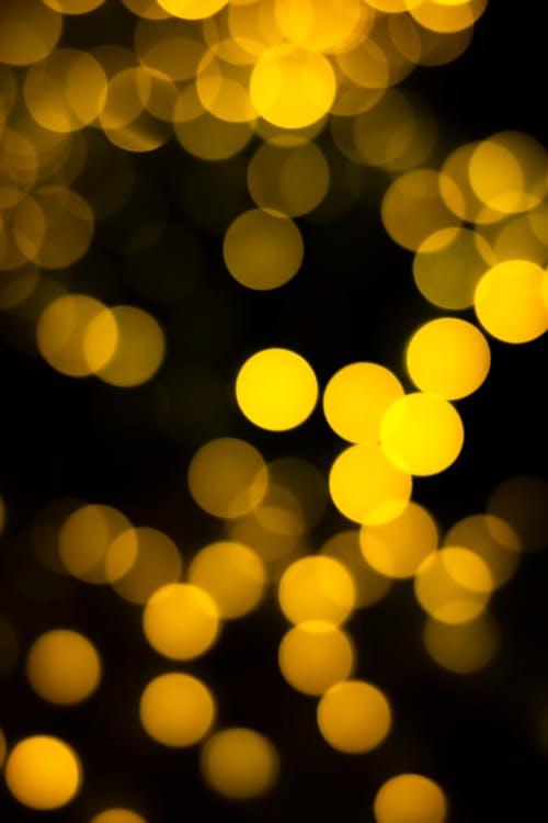 Blurred yellow lights on black background