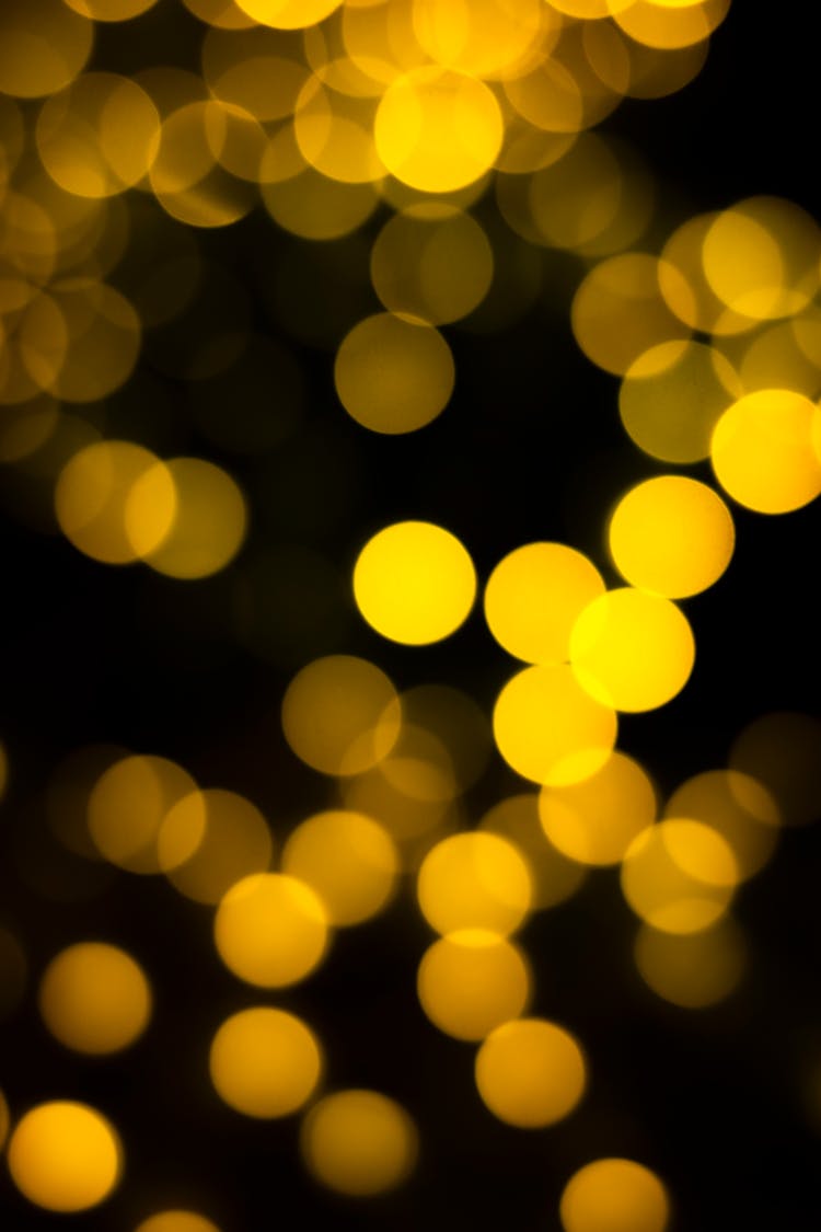 Blurred Yellow Lights On Black Background