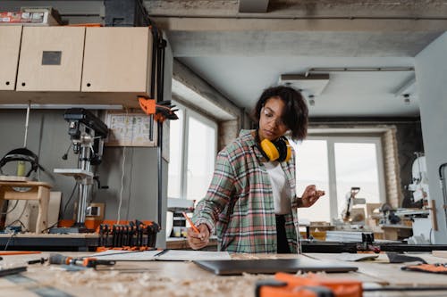 Free A Woman Doing Carpentry Stock Photo