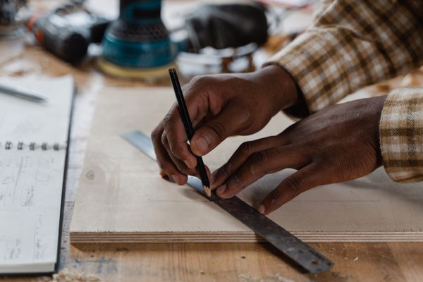 Measuring and marking wood in the workshop