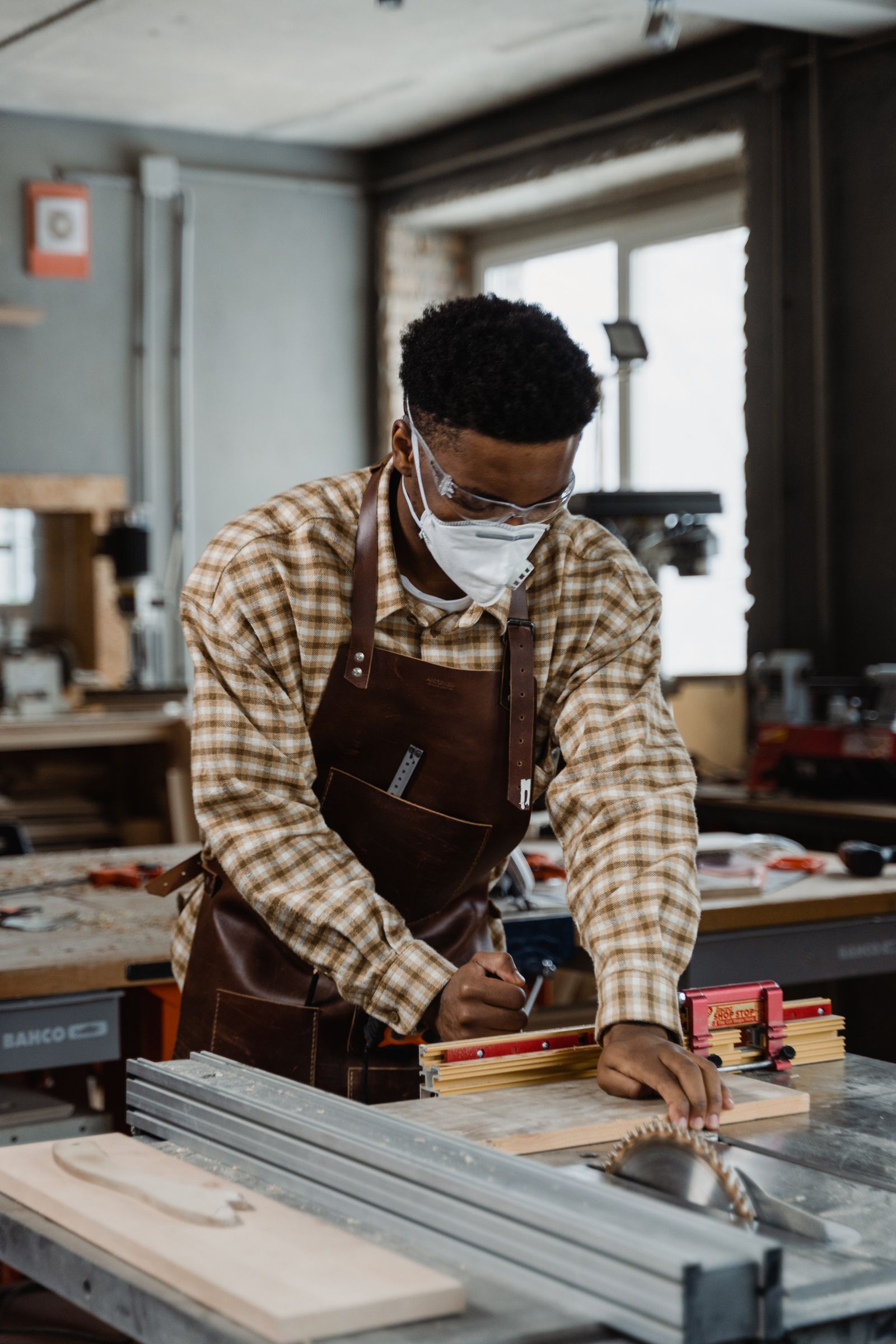 Craftsman working wood for a furniture piece
