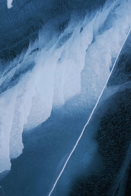 Detailed close-up of ice formations on Lake Baikal, capturing natural beauty in winter.