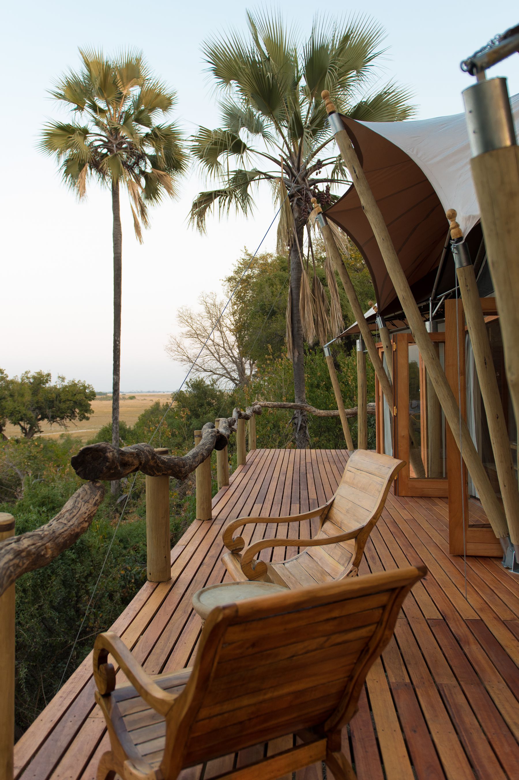Lodge deck overlooking the bush at golden hour
