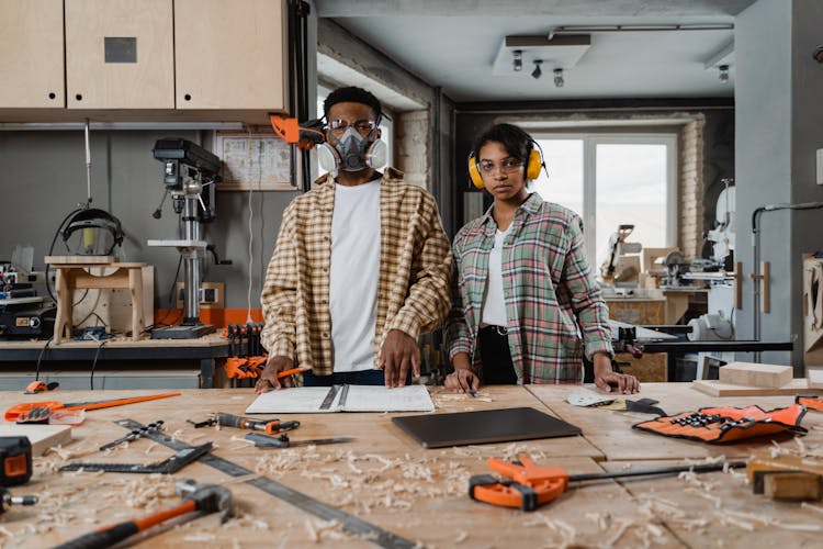 Carpenters Inside A Workshop