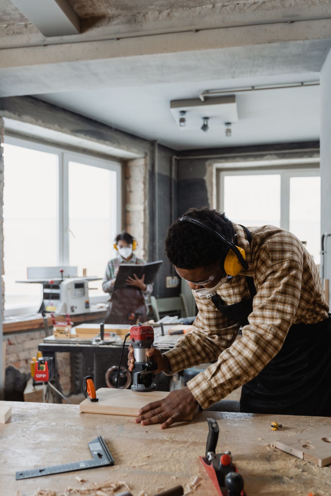 Carpenter working on a piece of wood