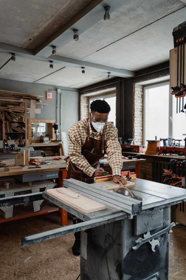 Using a table saw in the workshop