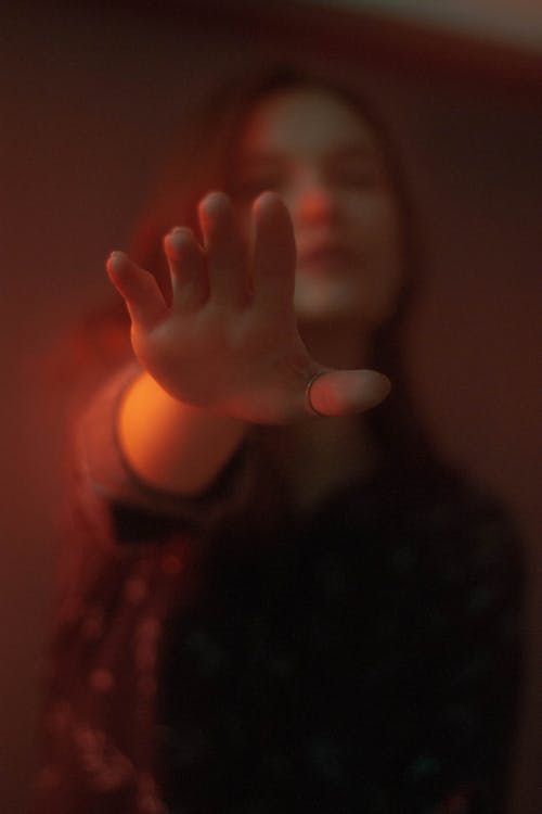 Girl Reaching out her Hand