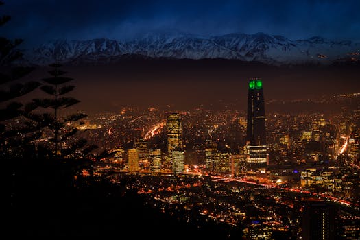 Beautiful night view of Santiago's skyline with the Andes mountains in the background.