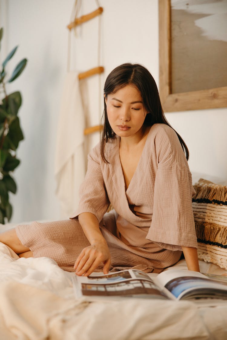 Woman Reading A Magazine