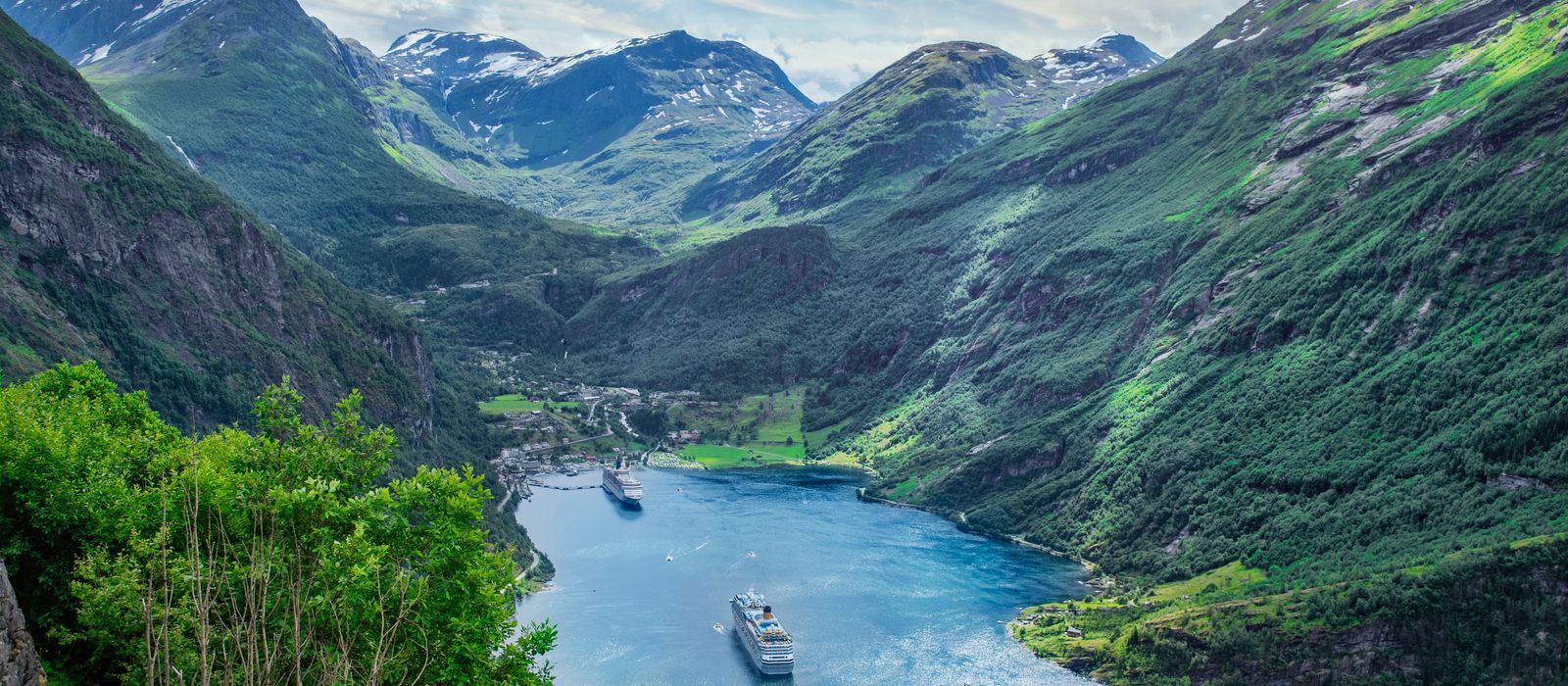 Ships far below in Geirangerfjord seen from the mountainside above the village.