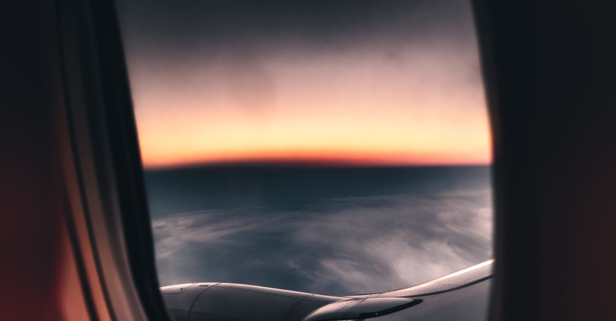 Flight Window View Snap Airplane Window View during Sunset · Free Stock Photo