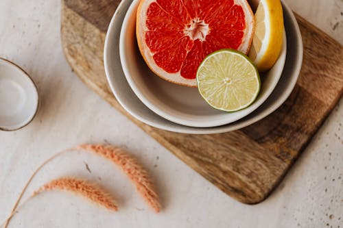 Základová fotografie zdarma na téma citron, dřevěné krájecí prkénko, fotografie jídla