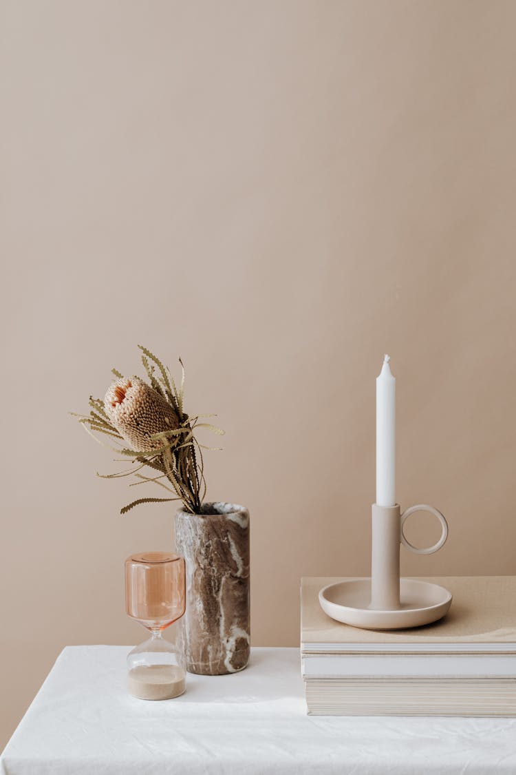 Hourglass Vase With Dried Flower And Candlestick