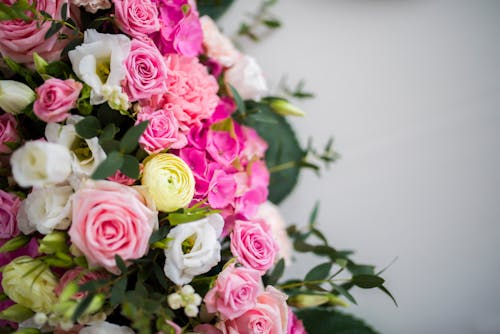 Bouquet of fresh flowers with green leaves